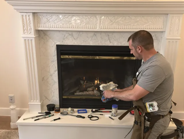 Dana Point Chimney Sweep performing fireplace maintenance in Dana Point, CA